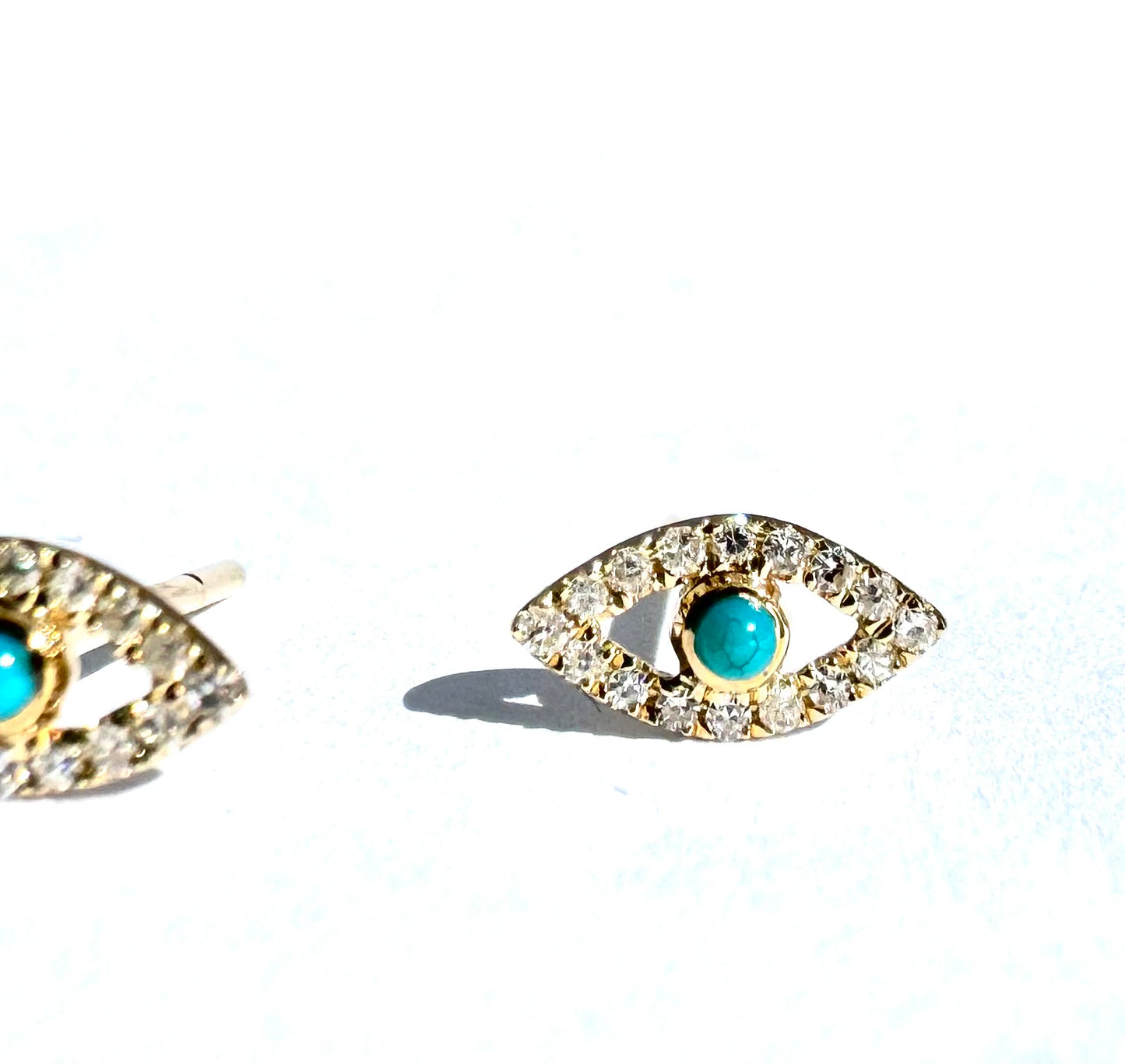 Eye earrings with turquoise center